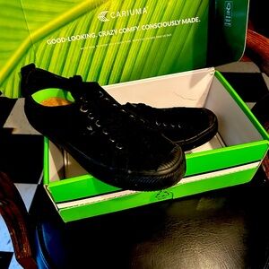 Black canvas Cariuma sneakers…just don’t fit my feet.